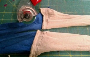 Cutting long strip of sewn t shirt scrap in half