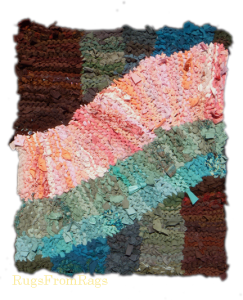 Alt: pink swish hand knit rag rug