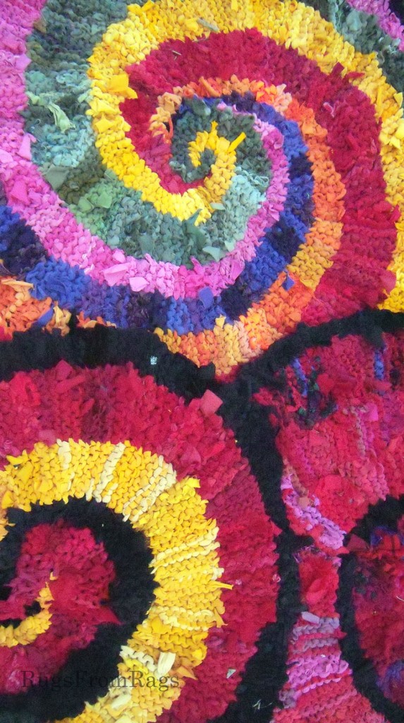 Three spiral rag rugs