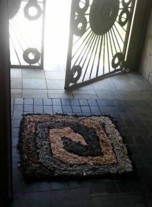 Brown and gray square spiral in the doorway, without the dog.
