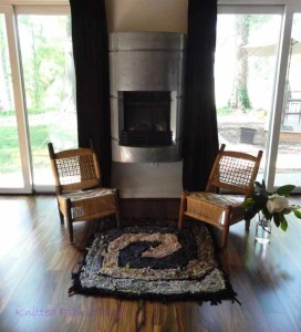 Brown and Gray Square Spiral by the fireplace.