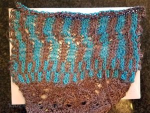 Swatching several options in K1B, including two stitch stripes and moving stripes.