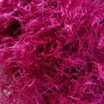 Fuzzy pink synthetic yarn.