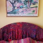 Sari silk knit shawl and log cabin weave rag rug, draped over the bed as inspiration.