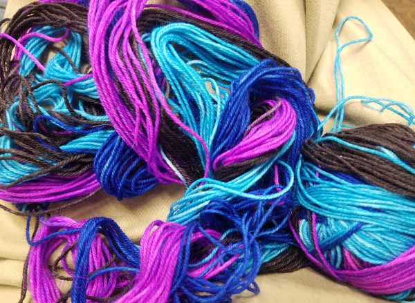 Divided sock yarn into two balls with roughly 44 sets of color changes each.