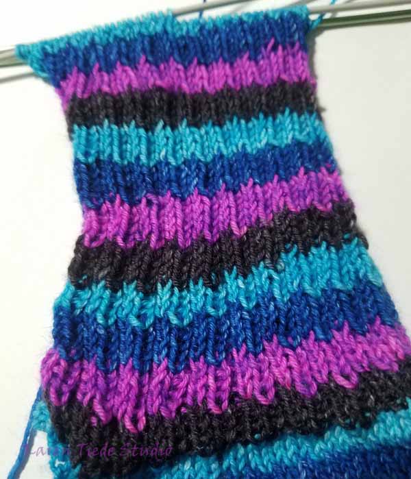 Right side of the cuff showing K1B on the first row of each color.