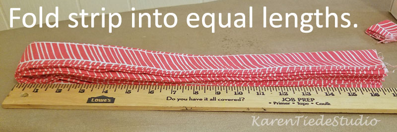 Fold the strip into equal units, 8" or 9".