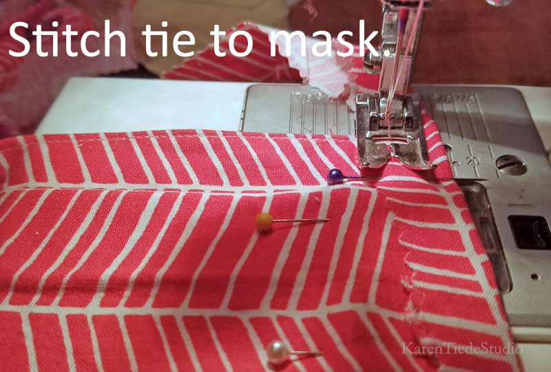 Stitch the tie to the mask.