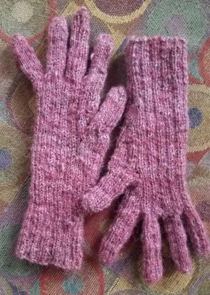 Handknit gloves after blocking.