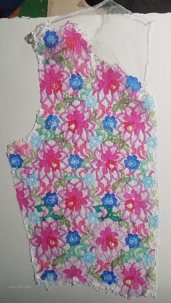 First test of painted lace, against watercolor paper.